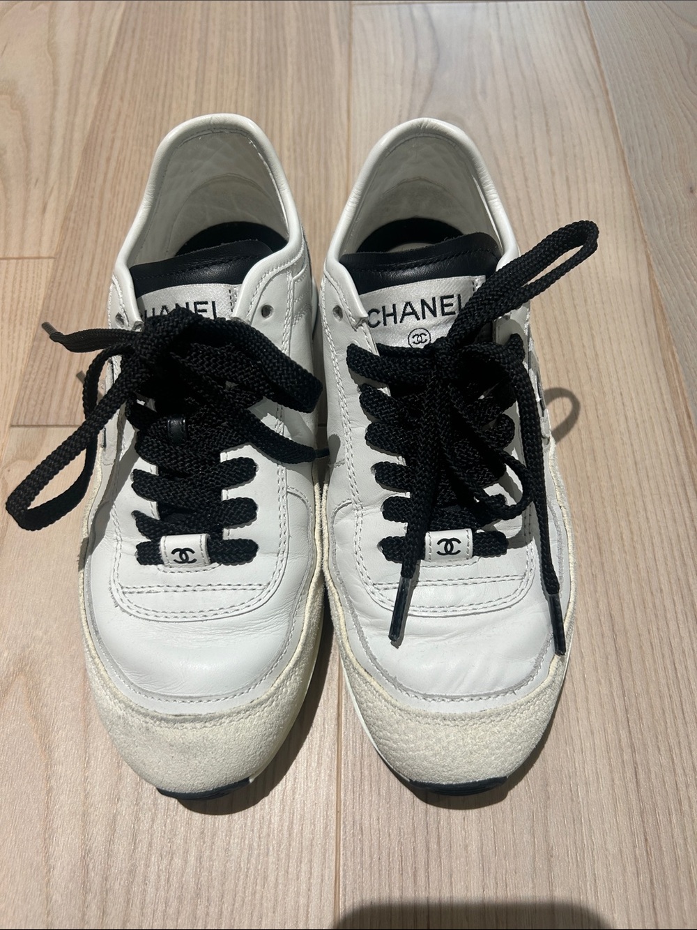 CHANEL White and Black Low-Top Leather Sneakers